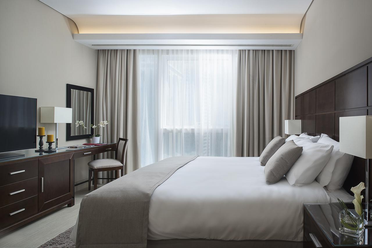 Dusit Doha Hotel Luaran gambar A bedroom
